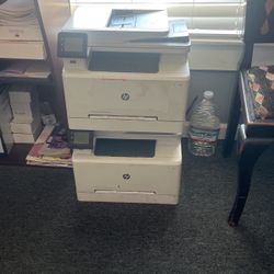 Two HP Color Laser Jet Pro Printer