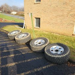 (4) 8x170 (8 Lug) 18 Inch Wheels With 37 Inch Tires