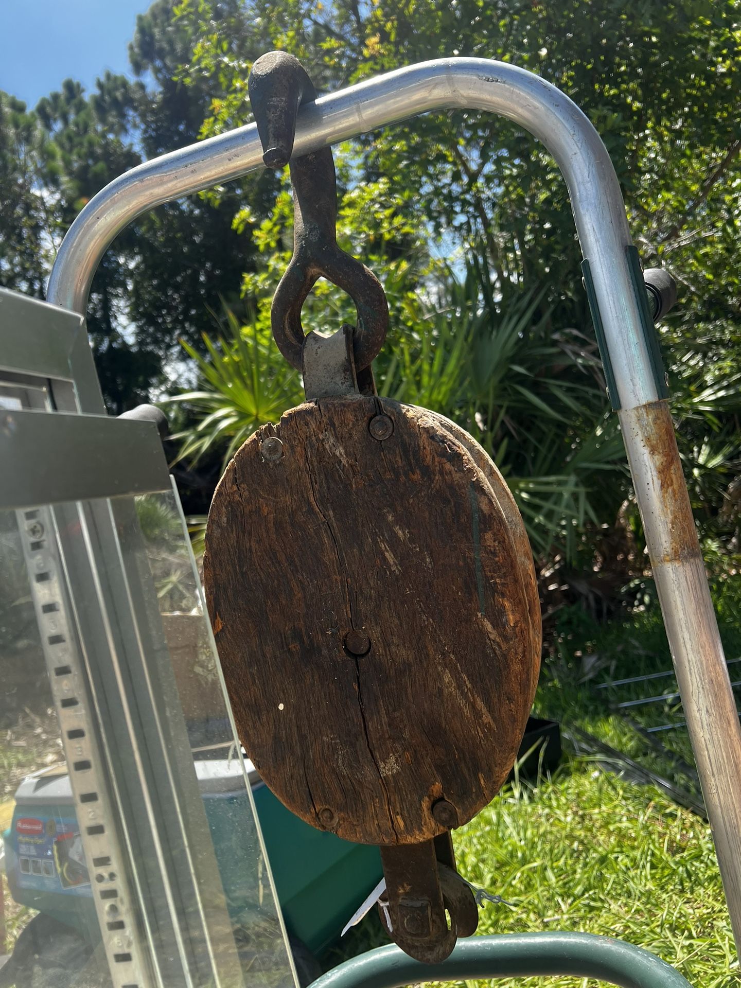 Antique wooden hook and pulley for an old fishing vessel. 