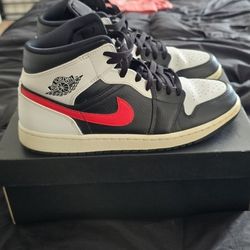 Jordan 1 Mid Black Chile Red. 