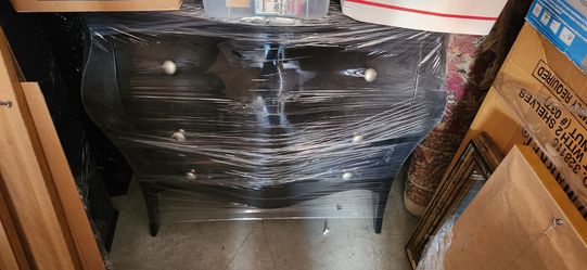 Crate & Barrel Avery Black Bombe Chest – Made in Italy”.