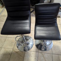 Two Bar Stools With Wear And Tear