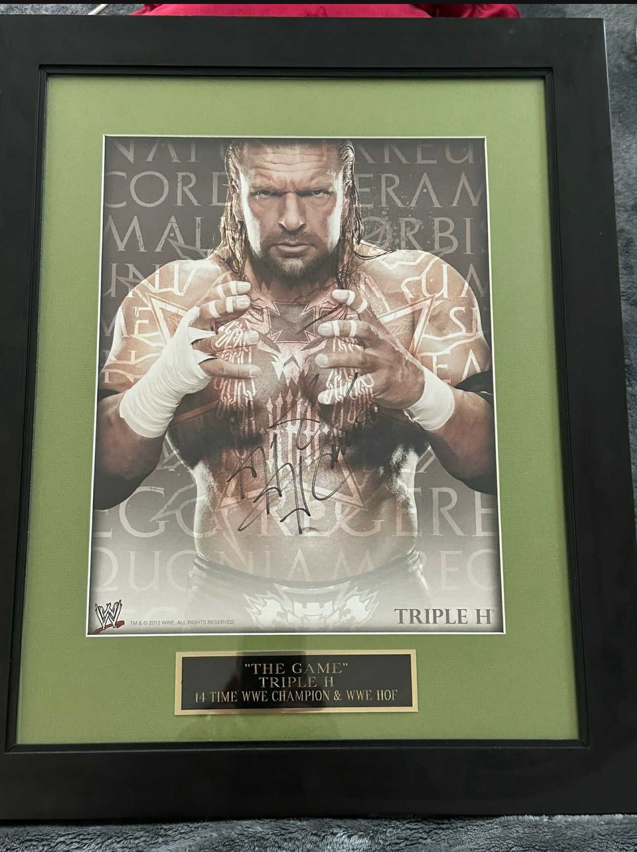 WWE TRIPLE H AUTOGRAPH, PROFESSIONALLY FRAMED , WITH JSA COA LETTER OF AUTHENTICATION.