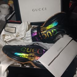 Gucci Rhyton Iridescent Logo sneakers in black leather