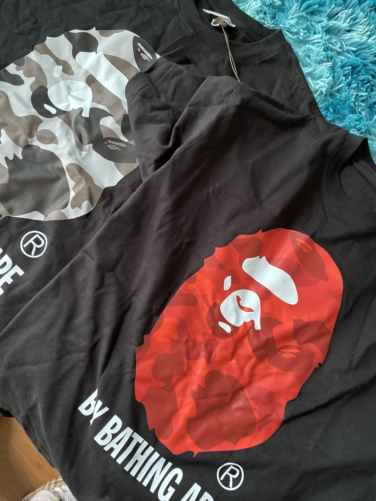 2 bathing ape shirts ( $65 each )