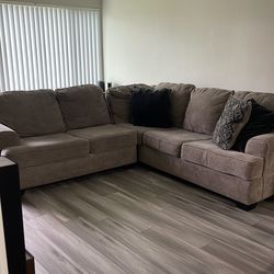 Ashley’s Sectional Grey Couch