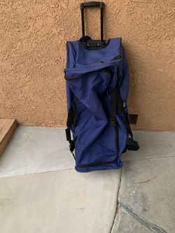 Big blue bag on wheels