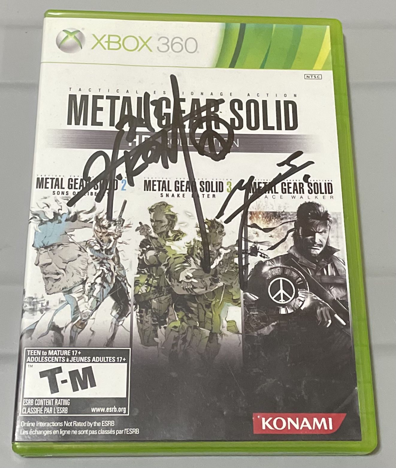 Metal Gear Solid HD Collection Signed By HIDEO KOJIMA & YOJI SHINKAWA
