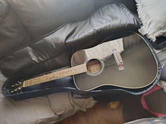 Carlo Robellin guitar with case