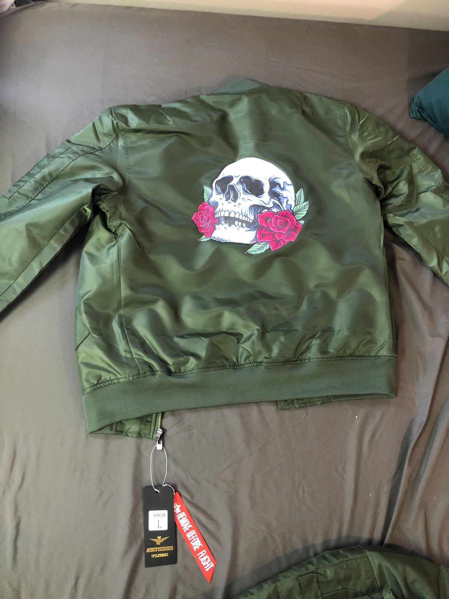 Bomber jacket with skull and rose on back new