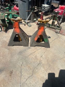 Heavy-duty steel jack stands with a 5-ton capacity. These Napa Fleet model 91-516 stands have a height range of 14 5/8 inches to 24 7/8 inches. The se