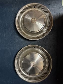 2 Cadillac Hubcaps
