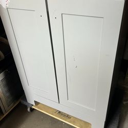 24” NO TOP BATHROOM VANITY NEW WITH SMALL DAMAGE ITS ALREADY FIXED