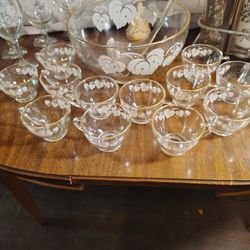 Punch Bowl Set, Dorothy Thorpe Silver Set, And A Wine Glass Set..