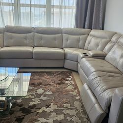 Lather Couch Sectional 3 Reclainers , One Convertible  French Bed 