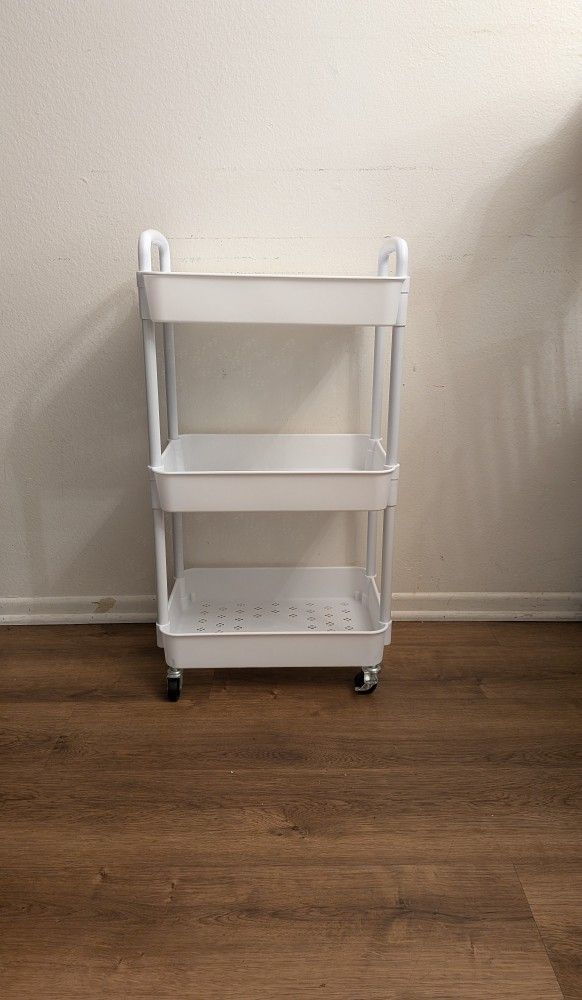 Small plastic rolling utility cart