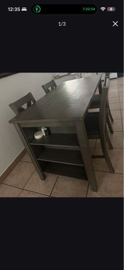 Gray Dining Table with Chairs and Shelves