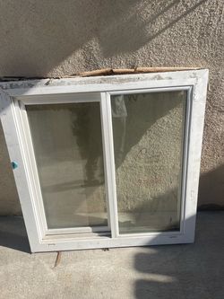 White Vinyl Sliding Window