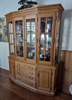 Oak China Hutch / Cabinet with Glass Doors. Two piece. Delivery Avaialble for a fee.