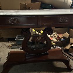 Antique Real Italian Marble Table With Dark Decorative Wooden Base. Marble Is White With Grey Etching. Dims Are 28” H X 36” L X 18” W