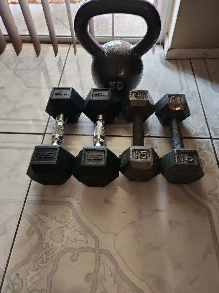 50lb Kettel Bell And Dumbells