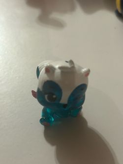 rare Blue Squirrlily from Hatchimals CollEGGtibles Season 4 (Hatch Bright). It features a translucent blue body with white and blue facial markings, o