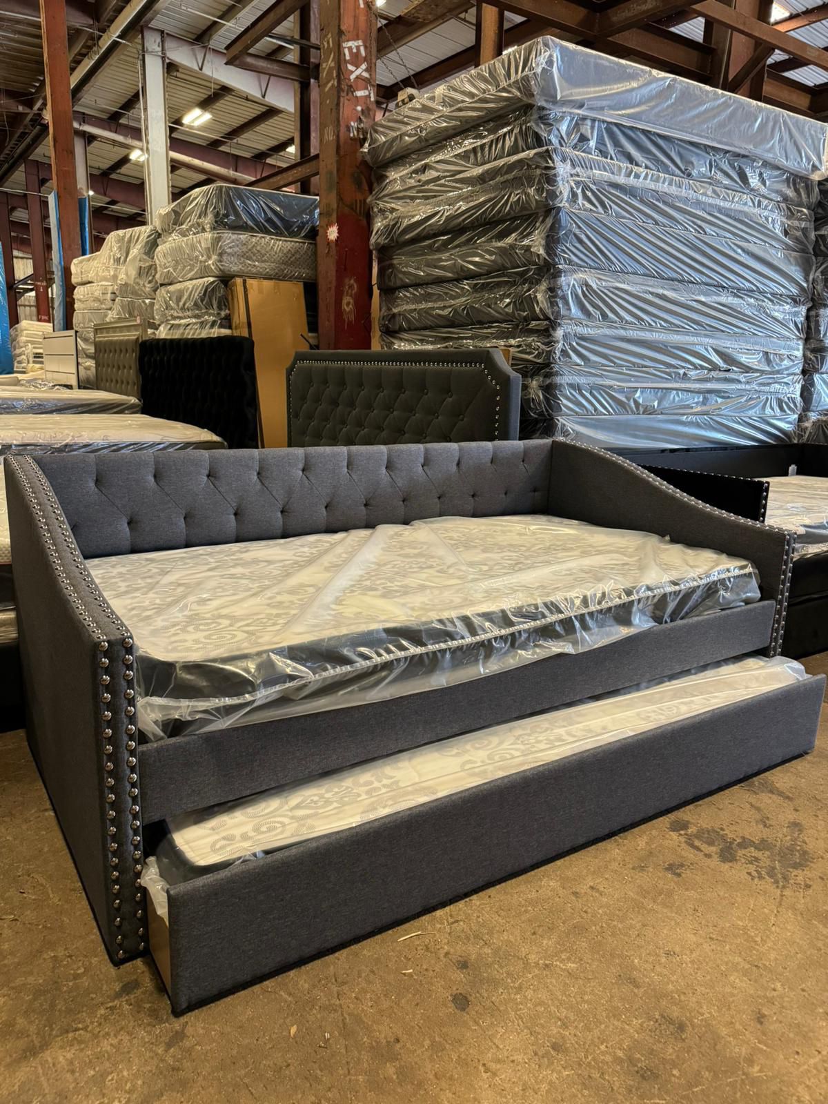 New Daybed Gray Color $339. Add Mattresses $537. Delivery & Assemble Available 