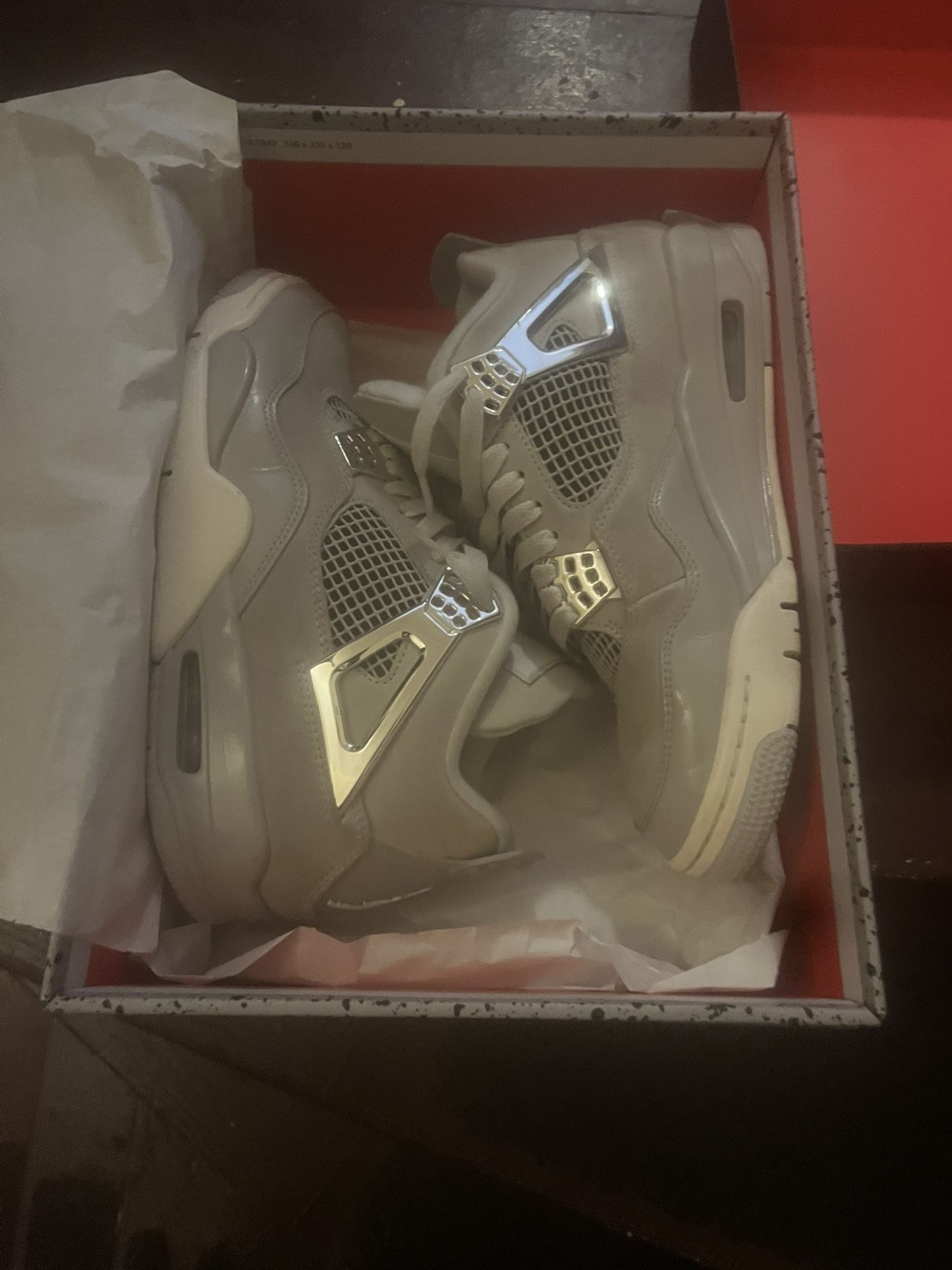 Jordan 4 Frozen Moments