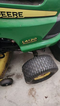 John Deer Riding Lawnmower.