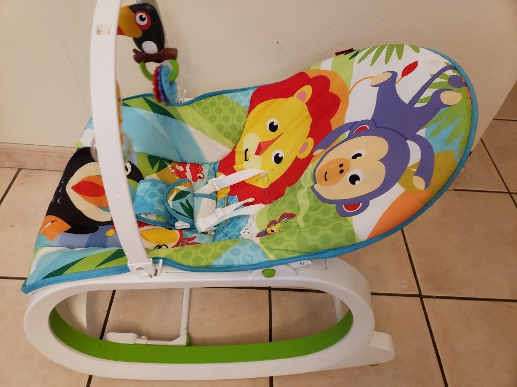 Fisher Price baby rocker with rattle and teether toy
