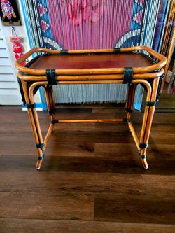 Mid-Century Modern rattan and bamboo side table, likely designed in Italy during the 1960s or 1970s. 25"×16"×24"