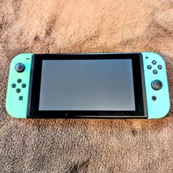 Nintendo Switch With 2 Controllers And 4 Games