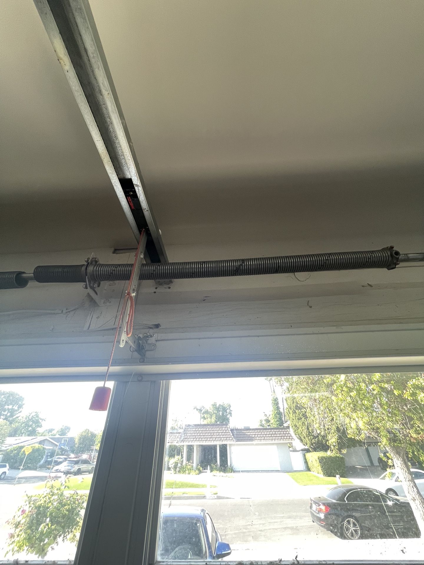 Garage Door Spring Adjustment And Replace