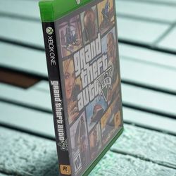 Grand Theft Auto V (Xbox One, 2014) Open-world Includes Manual & Insert (NO MAP). Very Good Condition. This image shows the video game Grand Theft Aut