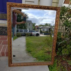 Large gold framed gilt vintage beveled mirror