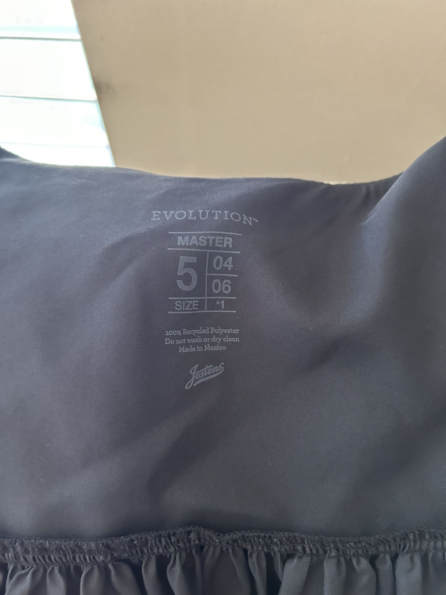 Masters degree graduation gown with hat