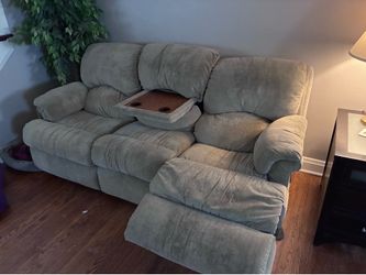 Tan-colored couch