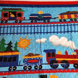 Quilted baby blanket train theme 41" X 41" . 