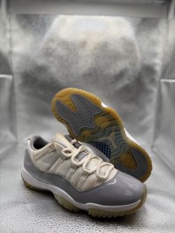 Air Jordan 11 low retro cement grey