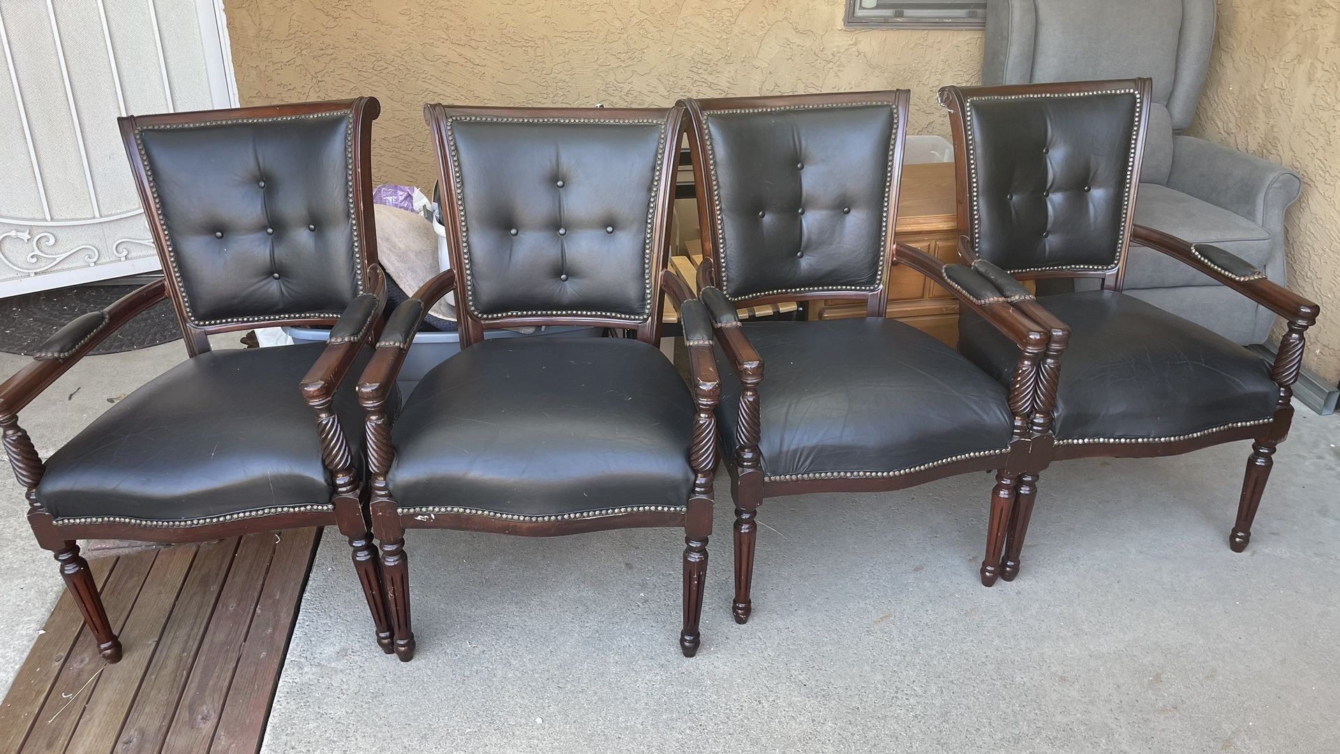 Four Arm Chairs