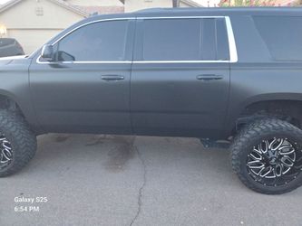 Lifted Full-Size SUV Matte Black Custom Wheels