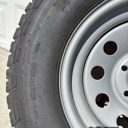 2 15x6 trailer wheels and 237/75/15 Goodyear wrangler trailrunner AT