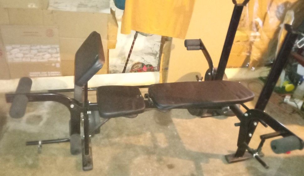 Folding easy storage weight bench w/ butterfly and leg press. 