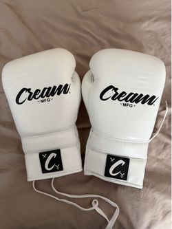 Cream boxing gloves