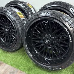 NEW 24x12 gloss black axe Offroad wheels wrapped in RBP tires 305/35r24. 8 lug 8x6.5
