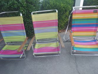 Beach Chair $10 each ,beach umbrella $10 each ,booige boards $6 each