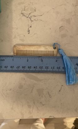 Tiffany and Company, 3 inch silver comb with tassel