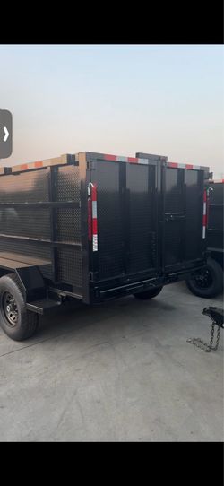 2027 HD Dump trailer 14ft long w steel ramps and scissor lift