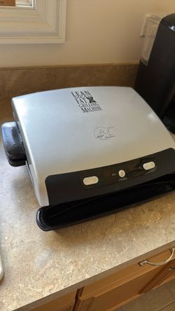 George Forman lean fat grilling machine