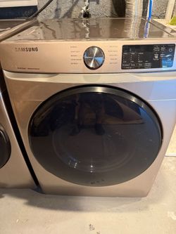 Samsung front-load washer and electric dryer